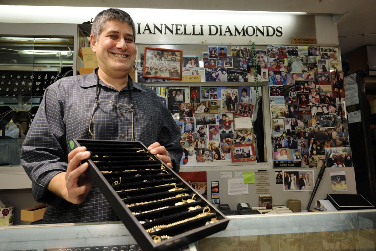 Anthony Iannelli of Iannelli Diamonds shows off some of the gold pieces for sale in his store on 47th Street in New York’s diamond district. The price of the precious metal is soaring, setting a record of $1,119 an ounce on Wednesday. Associated Press photos (Associated Press photos)