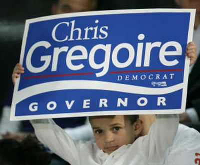 
Lucas Sherles, 4, holds a sign at a Gregoire campaign rally Monday  in Auburn, Wash. Associated Press
 (Associated Press / The Spokesman-Review)