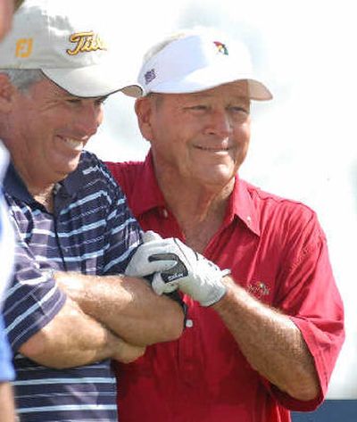 
Arnold Palmer, right, and Curtis Strange share a laugh on Sunday. 
 (Associated Press / The Spokesman-Review)