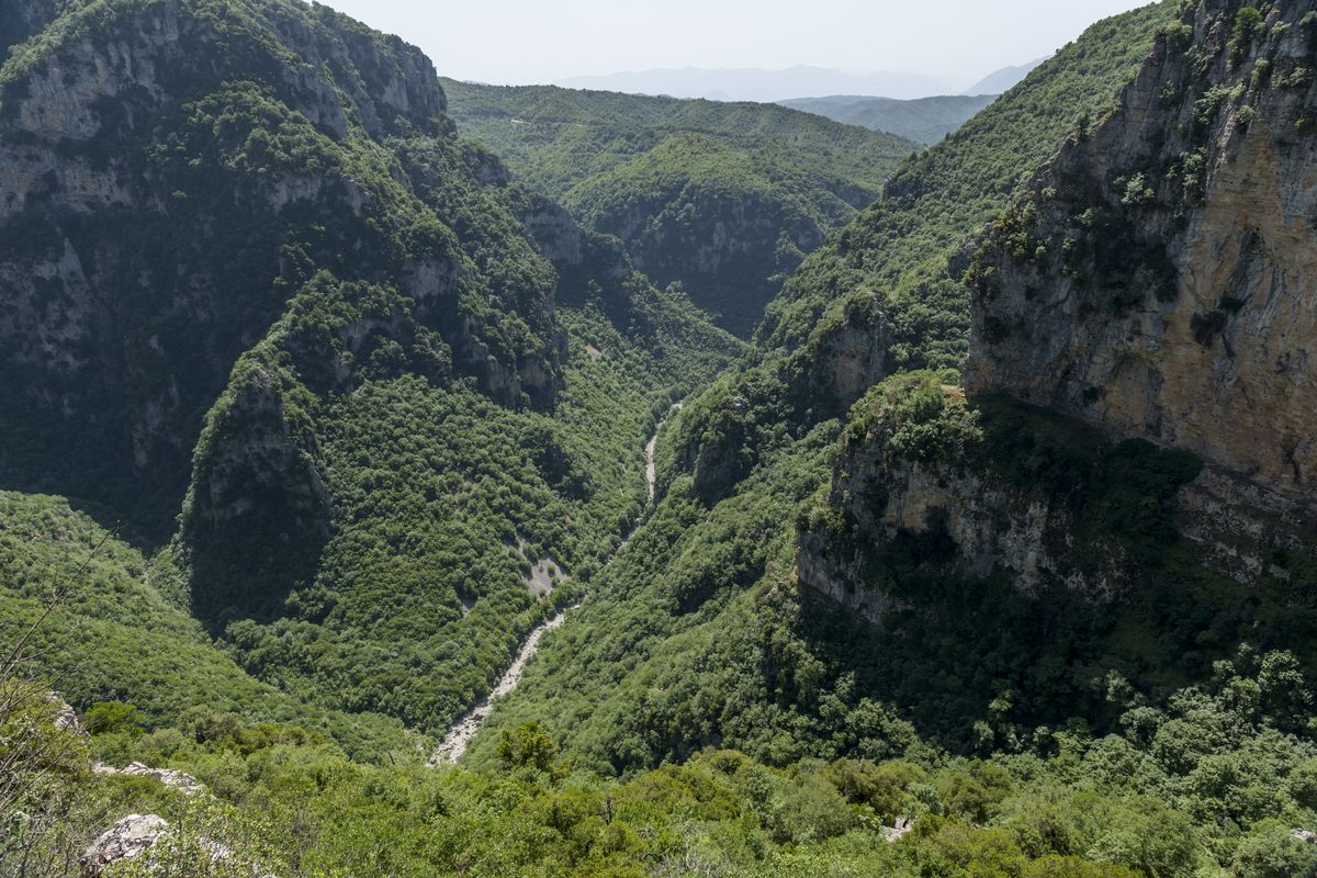 A view of the Vikos Gorge from the village of Monodendri on June 11 in the Zagori region of Greece. The region, in northwest Greece, is a lofty realm of cascading rivers, emerald forests and ancient villages carved from the mountains that offer a view of the country beyond the island postcards. (New York Times)