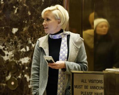 In this Nov. 29, 2016, file photo Mika Brzezinski waits for an elevator in the lobby at Trump Tower, Tuesday, Nov. 29, 2016, in New York. President Donald Trump has used a series of tweets to go after Mika Brzezinski and Joe Scarborough, who've criticized Trump on their MSNBC show 