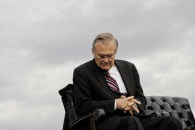 
Outgoing Secretary of Defense Donald Rumsfeld sits on a stage during a farewell ceremony in his honor Friday at the Pentagon.
 (Associated Press / The Spokesman-Review)