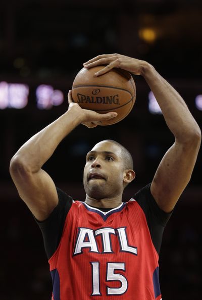 Atlanta’s Al Horford had 21 points, 10 rebounds and 10 assists in Atlanta’s 105-87 win over Philadelphia. (Associated Press)