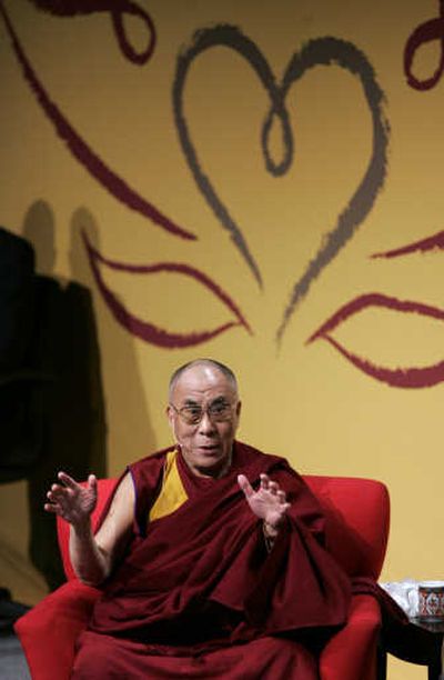 
The Dalai Lama speaks Friday at a conference on compassion at the University of Washington  in Seattle. Organizers of the five-day conference say his visit is expected to draw more than 150,000. Associated Press
 (Associated Press / The Spokesman-Review)