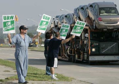 
Members of UAW Local 31 picket Monday morning   at the Fairfax Assembly plant of General Motors in Kansas City, Kan. Associated Press
 (Associated Press / The Spokesman-Review)