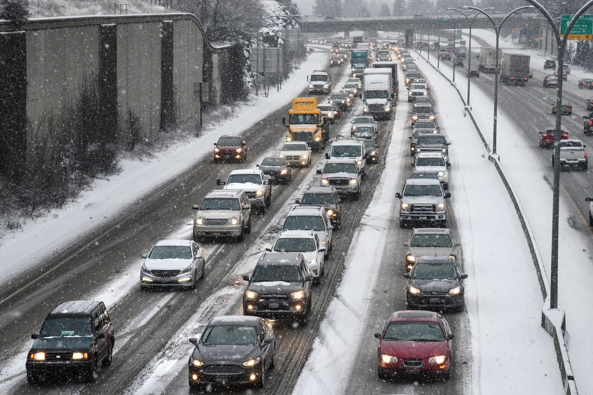 Traffic on westbound Interstate 90 was bumper-to-bumper in February 2019 during a snowy morning commute into downtown. (Dan Pelle / The Spokesman-Review)