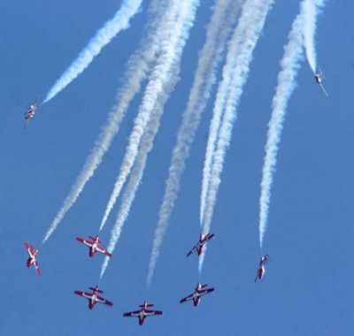 
The Canadian Forces Snowbirds rehearse Friday for weekend performances over Malmstrom Air Force Base, Mont. One of the jets crashed later, killing the pilot. 
 (Associated Press / The Spokesman-Review)