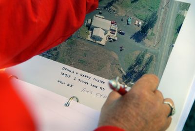 EWU professor Linda McCollum documents well locations while researching why water in the West Plains aquifer  is being depleted.  (Brian Plonka / The Spokesman-Review)