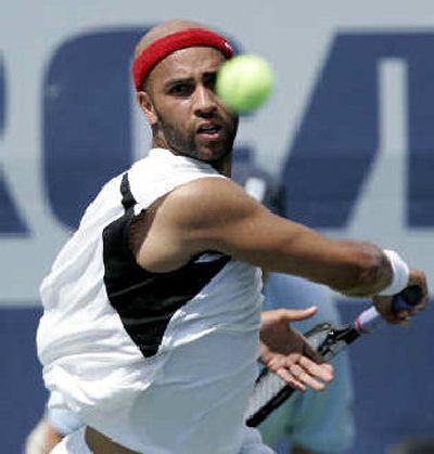 
James Blake returns a shot to Andy Roddick at the RCA Championships.
 (Associated Press / The Spokesman-Review)