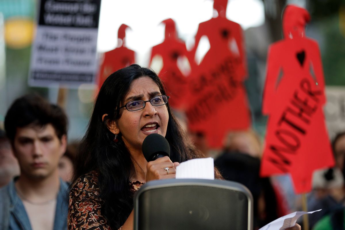 Seattle City Council member Kshama Sawant speaks Aug. 1, 2019, during a protest against family separation at the border and other immigration-related issues outside ICE headquarters in Seattle.  (Ted S. Warren)