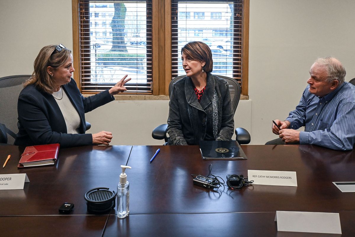 Congresswoman Cathy McMorris Rodgers, center, listens to Medical Lake Mayor Terri Cooper, left, and Elk resident and vice chair of the Spokane Region Long Term Recovery Group Dick Ziehnert, right, after a roundtable in January 2024 in the Spokane County Courthouse Spokane County Commissioners Main Floor Conference Room.  (DAN PELLE/THE SPOKESMAN-REVIEW)