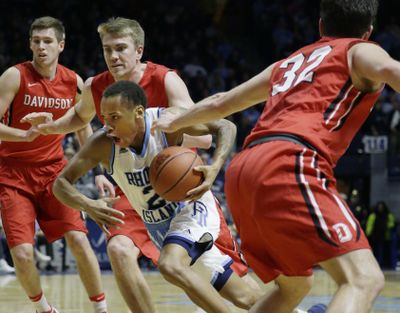Rhode Island guard Fatts Russell (2) threads the Davidson defense on his way to the hoop during the second half of an NCAA college basketball game Friday, Feb. 9, 2018, in South Kingstown, R.I. (Stephan Savoia / Associated Press)