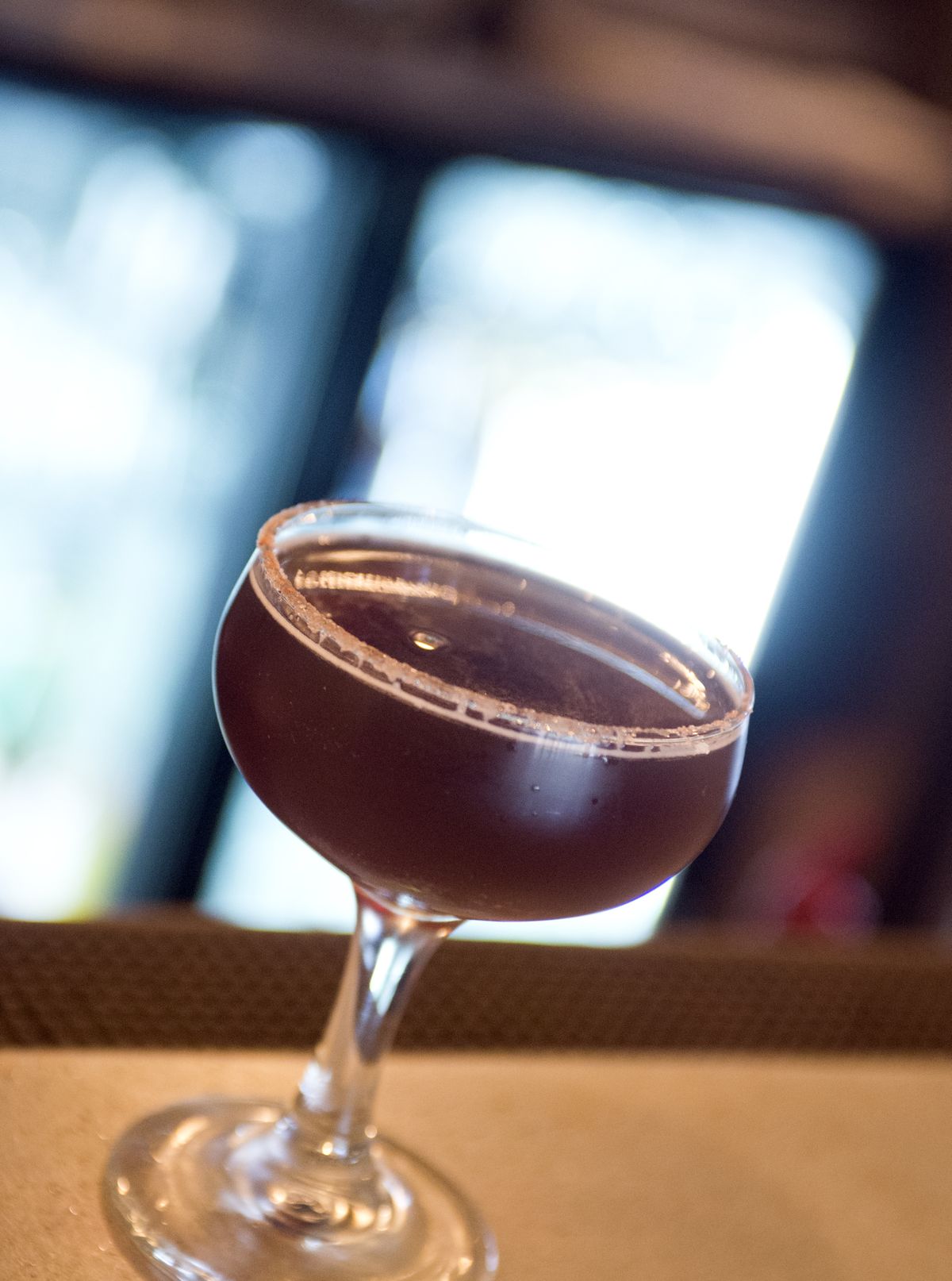 Curtis Day’s November Rain uses bourbon, sweet red vermouth, Licor 43 and a pinch of cinnamon, which he tops with a little stout. (Jesse Tinsley)