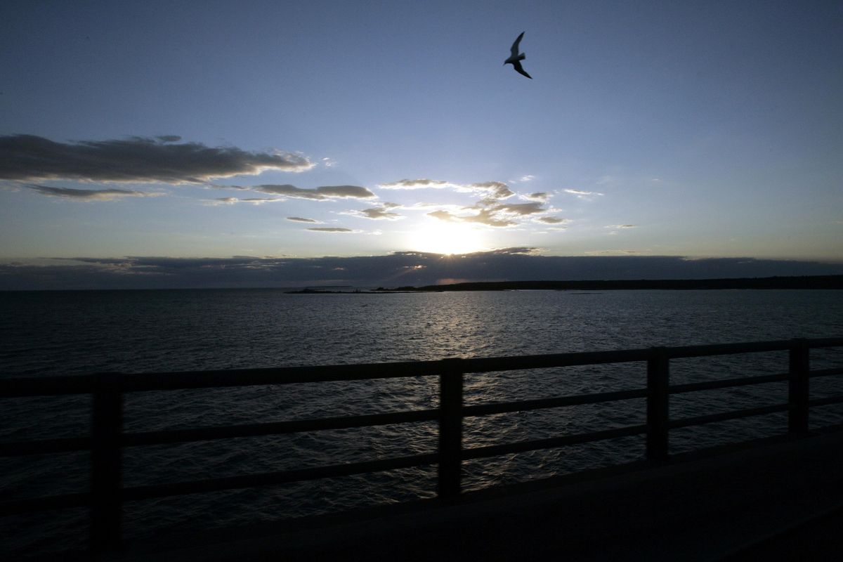 In a June 30, 2005 file photo, Michigan’s Upper Peninsula and Lake Michigan is seen from the Mackinac Bridge in Mackinaw City, Mich. President Donald Trump wants to eliminate federal support of a program that addresses the Great Lakes’ most pressing environmental threats. Trump’s 2018 budget, released Thursday, March 16, 2017, would remove all funding for the Great Lakes Restoration Initiative, which has received strong support from members of Congress in both parties since President Barack Obama established it in 2009. (Carlos Osorio / Associated Press)