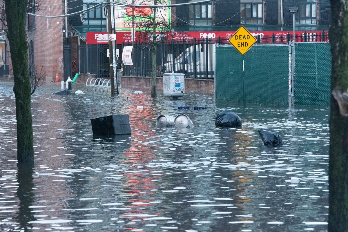 Coastal flooding is seen on the streets of Red Hook, Brooklyn, on Friday, Dec. 23, 2022. (Gardiner Anderson/New York Daily News/TNS)  (Gardiner Anderson/New York Daily News/TNS)