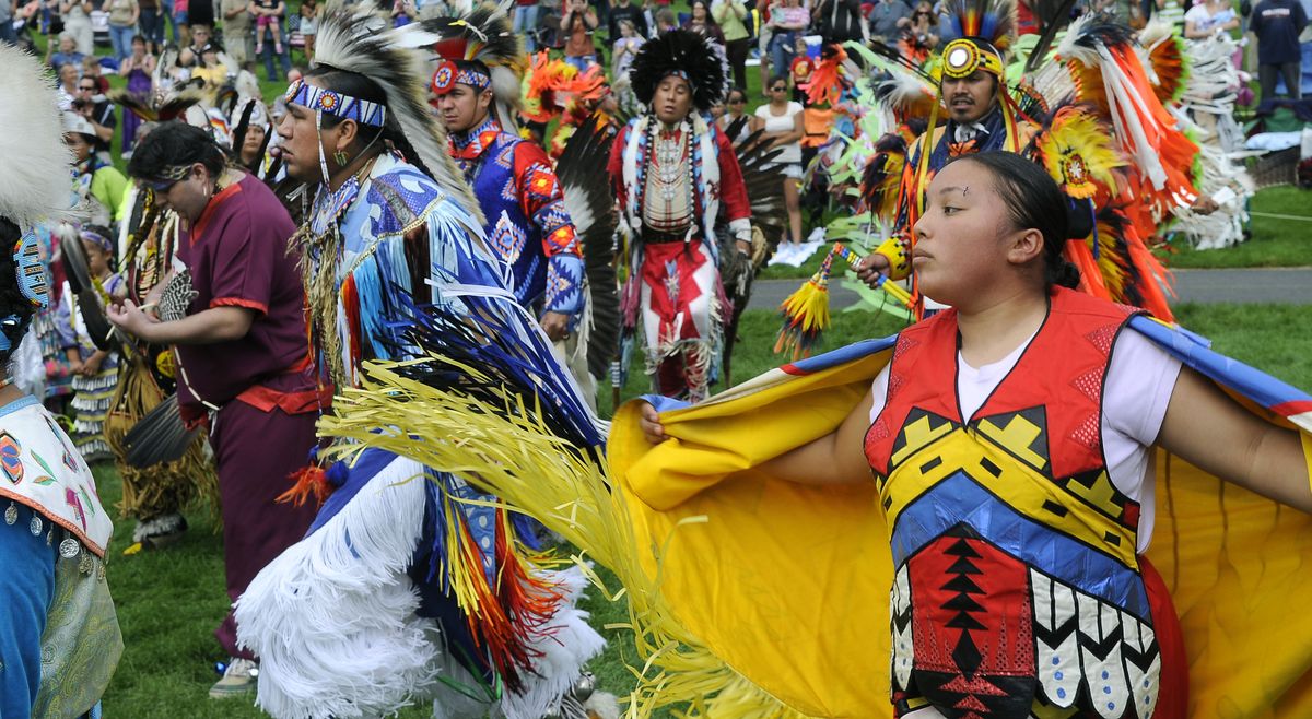 The Riverfront Park Lilac Bowl is splashed with color Saturday as dancers take part in  the 20th annual Spokane Falls Northwest Indian Encampment and Pow Wow Grand Entry. (PHOTOS BY DAN PELLE / The Spokesman-Review)