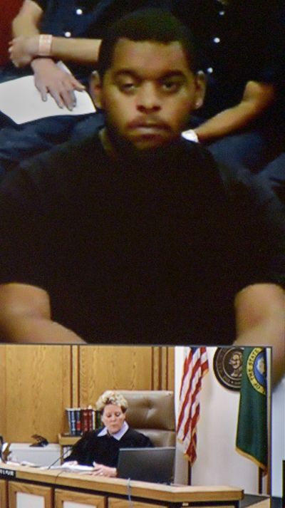 Avondre C. Graham, 17, makes his first appearance Monday, via a video link, before Judge Annette Plese in Spokane County Superior Court.