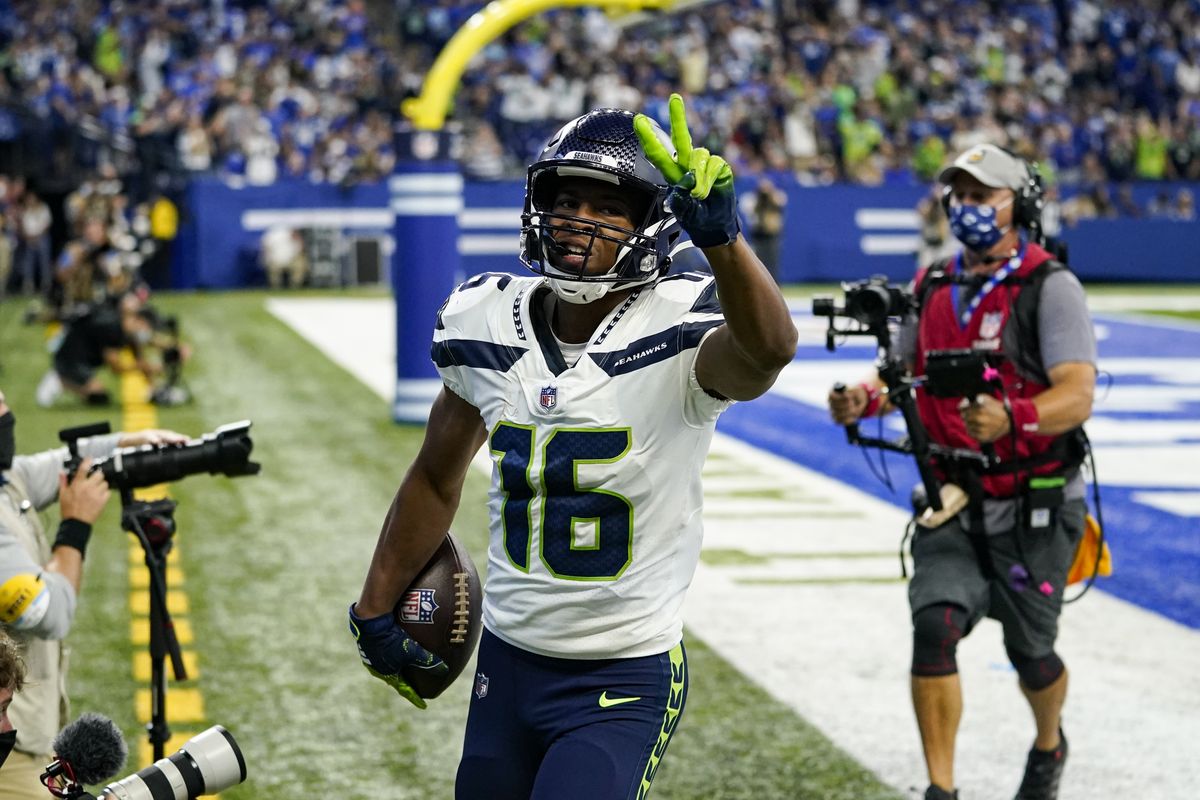 Seattle Seahawks wide receiver Tyler Lockett (16) celebrates after a touchdown against the Indianapolis Colts in the first half of an NFL football game in Indianapolis, Sunday, Sept. 12, 2021.  (Charlie Neibergall)