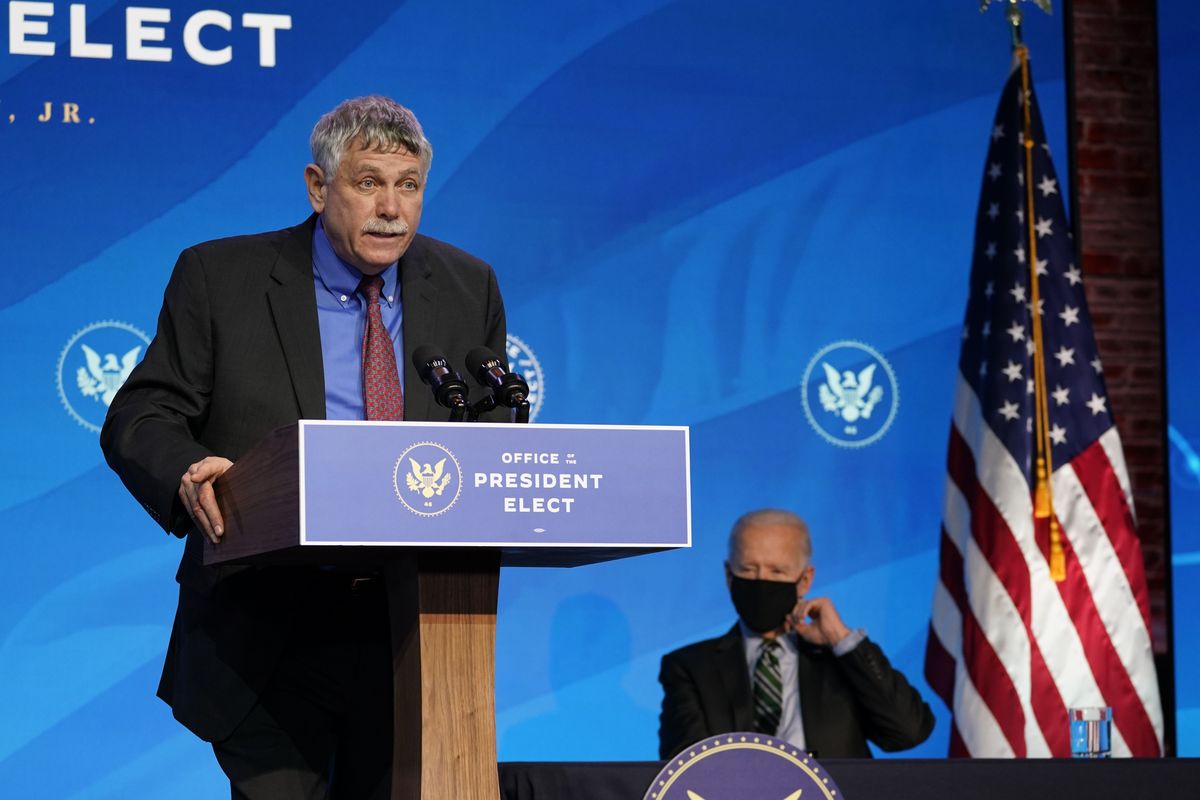 President-elect Joe Biden, right, listens as his nominee for the director of the Office of Science and Technology Policy and adviser on science Eric Lander speaks during an event at The Queen theater, Saturday, Jan. 16, 2021, in Wilmington, Del.  (Matt Slocum)