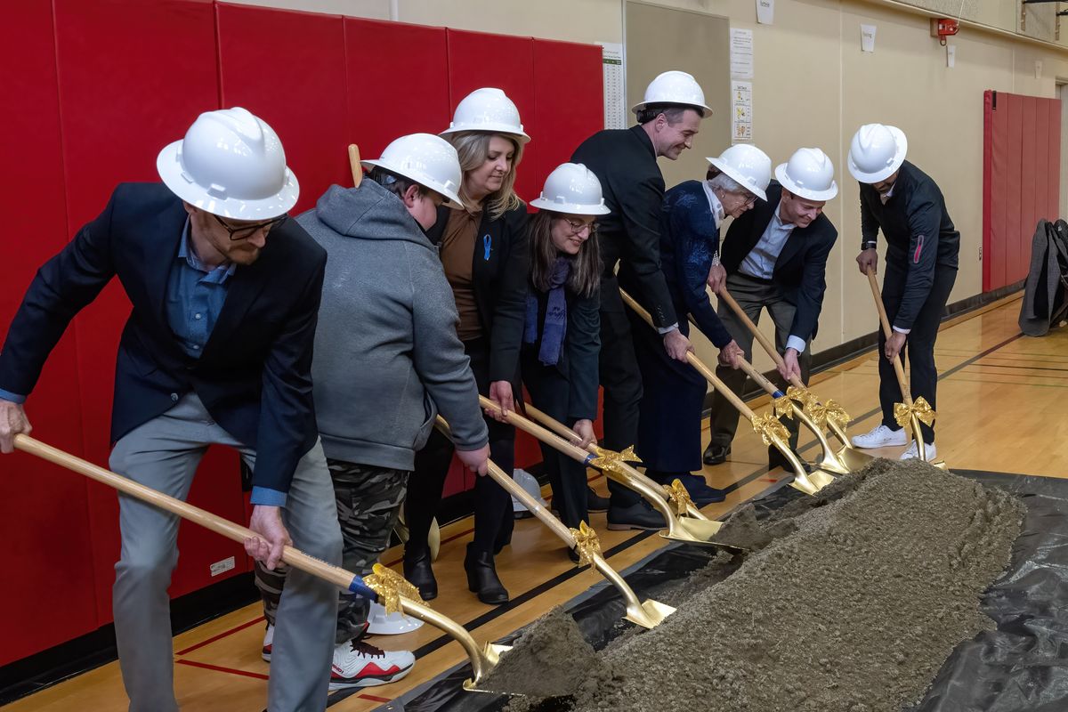 Because of the weather, the ceremonial shovel turn of soil by dignitaries was held indoors during the Carla Olman Peperzak Middle School groundbreaking ceremony, Tuesday, March 15, 2022, in the Mullan Road Elementary School gym. Building construction is scheduled to be completed in August of 2023.  (COLIN MULVANY/THE SPOKESMAN-REVIEW)