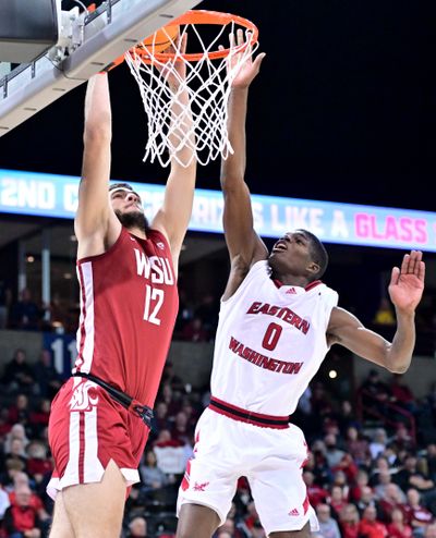 Washington State forward Mael Hamon-Crespin (12) throws down a dunk during a game against Eastern Washington on Nov. 21 at the Spokane Arena. Hamon-Crespin has left the program for 