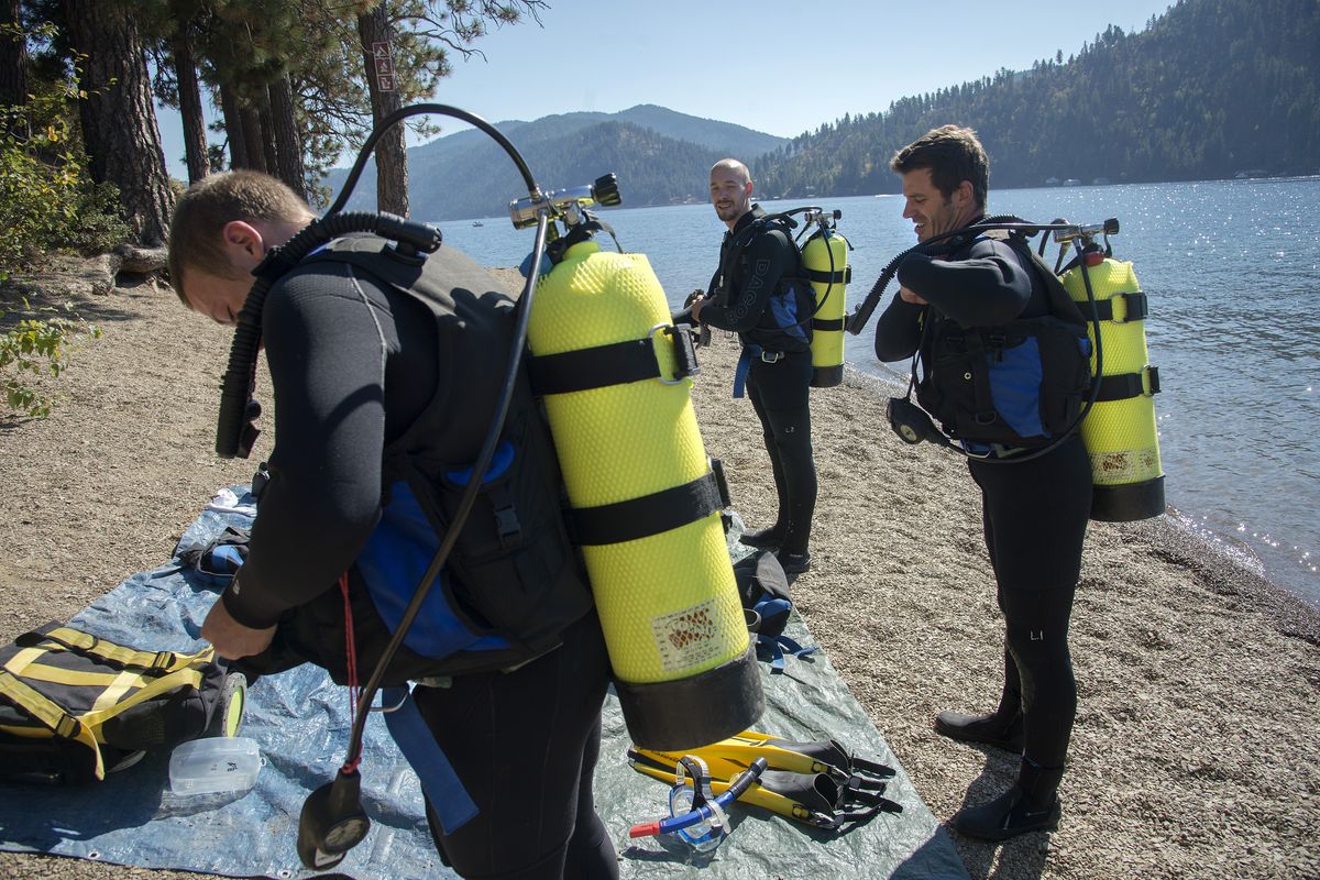 At Osprey Point, scuba diving students gear up before heading into Lake Coeur d’Alene for a lesson given by instructor Tim McCall. (Colin Mulvany)