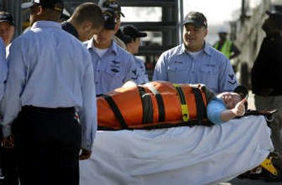 
Laura Montero gives a thumbs-up Tuesday after she arrives on shore  in Coronado, Calif.Associated Press
 (Associated Press / The Spokesman-Review)