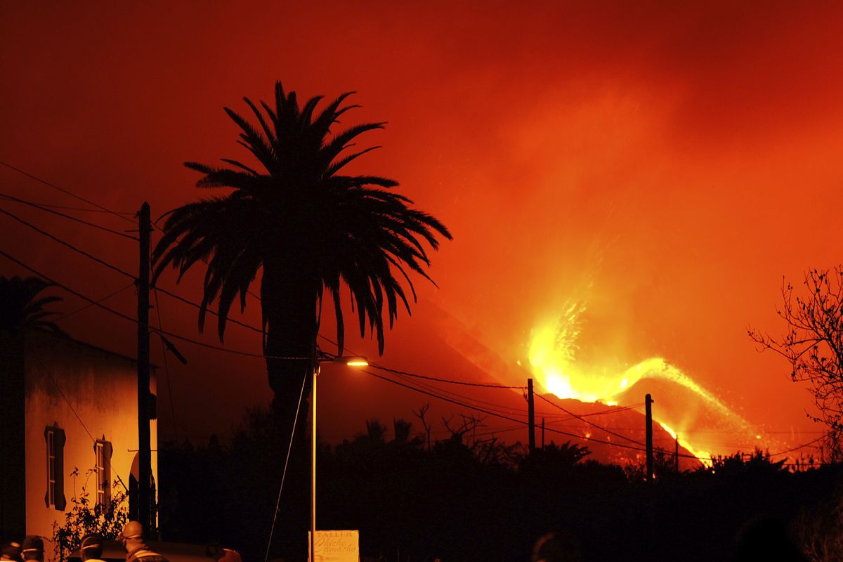 A volcano continues to spew out lava on the Canary island of La Palma, Spain, in the early hours Sunday.  (Daniel Roca)