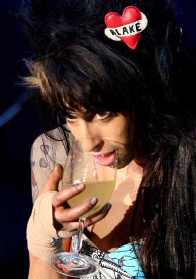 
Amy Winehouse's struggles with drugs and health worries have been played out almost daily in British papers.Associated Press
 (Associated Press / The Spokesman-Review)