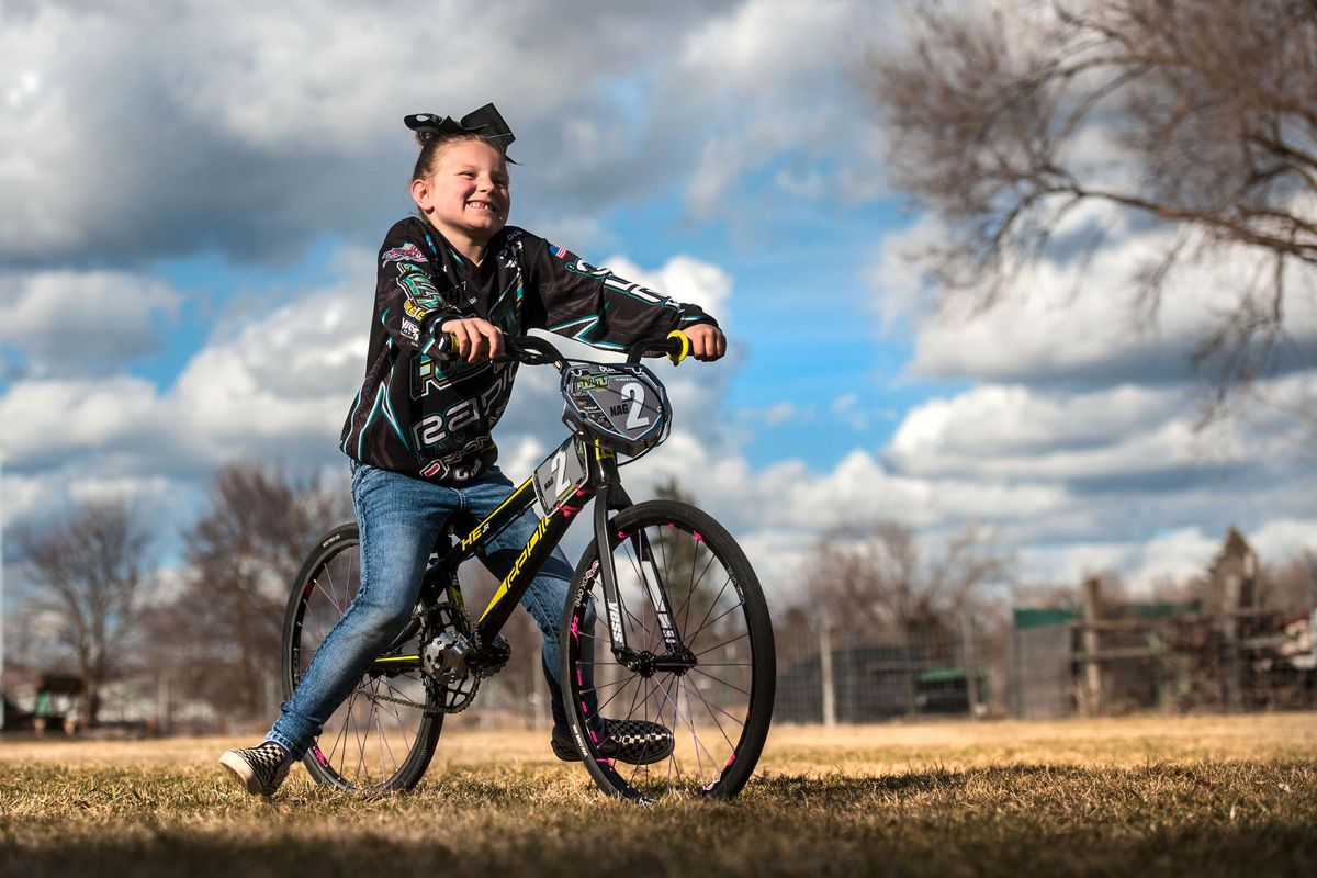 Seven-year-old Kennedy Knopp of Greenacres is photographed on her bike at her home on Tuesday, March 26, 2019. She is second in the nation for her age group in BMX racing and will be riding for Team USA in the 2019 UCI BMX World Championships in Belgium in July. (Kathy Plonka / The Spokesman-Review)