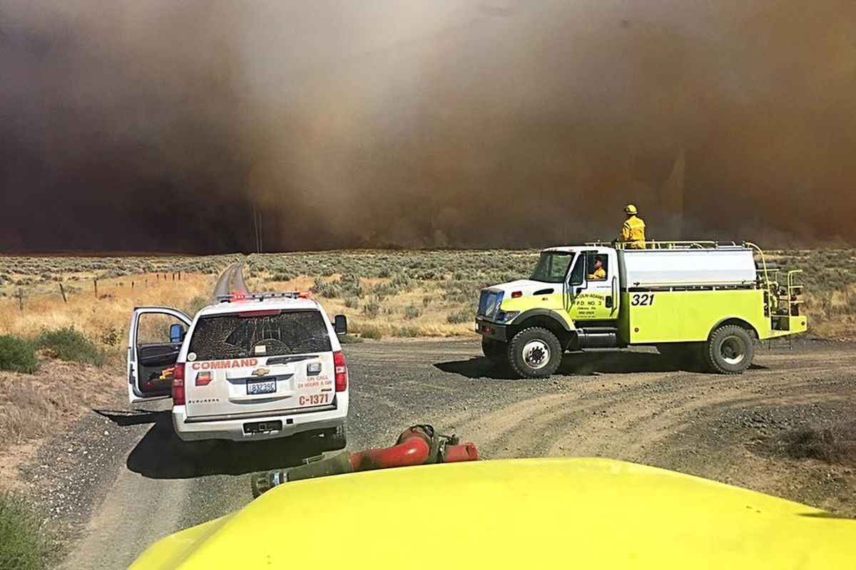 Grant County firefighters on scene at the Black Rock fire, which has burned more than 23,000 acres near Wilson Creek, Washington. (Grant County Fire District 13 / Courtesy)