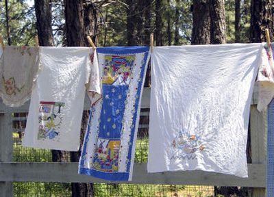
Using an old-fashioned clothesline to gently dry vintage fabrics leaves them smelling fresh and clean. 
 (Cheryl-Anne Millsap / The Spokesman-Review)