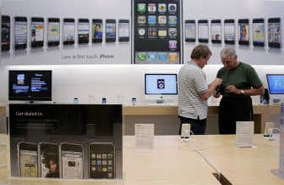 
iPhone is featured in a display at an Apple store in Palo Alto, Calif. Associated Press photos
 (Associated Press photos / The Spokesman-Review)