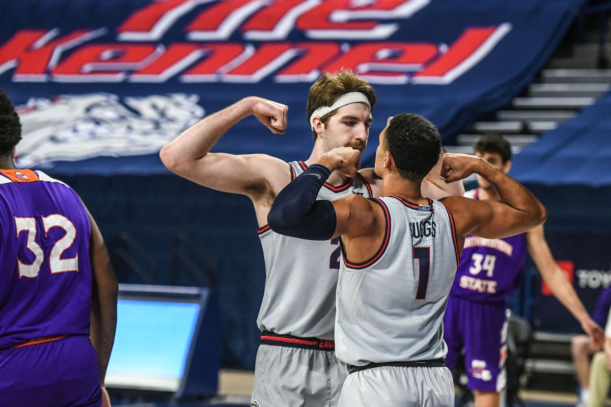 Gonzaga forward Drew Timme and guard Jalen Suggs show off their might after Suggs was fouled against Northwestern State, Monday, Dec. 22, 2020, in the McCarthey Athletic Center.  (Dan Pelle/THESPOKESMAN-REVIEW)