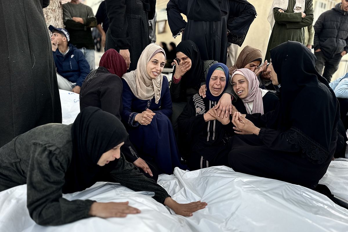 March 18, 2025, Khan Yunis, Gaza Strip, Palestinian Territory: The bodies of Palestinians who lost their lives in the Israeli strike in Khan Yunis are taken from a hospital morgue in Khan Yunis, Gaza Strip, where grieving relatives of the deceased mourn their loss, on March 18, 2025. The death toll from Israel
