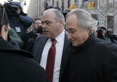 Bernard Madoff, right, arrives at Federal Court for a scheduled hearing in New York.FILE  (FILE Associated Press / The Spokesman-Review)