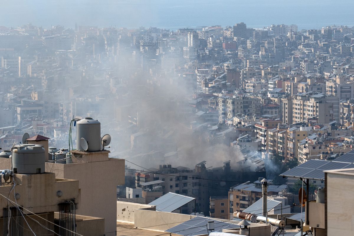 Smoke rises from a building following an Israeli airstrike on Saturday in Beirut, Lebanon.  (Carl Court)