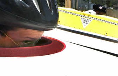
Tim Taigen, 12, concentrates on his run for the stock division of the state All-American Soap Box Derby championship against his younger brother Taylor, 8, on Saturday. Taylor won the race and a chance to compete in the world championship in Akron, Ohio. 
 (Jed Conklin / The Spokesman-Review)
