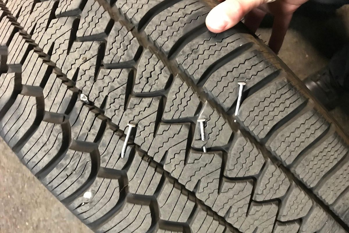In this photo released Saturday, Aug. 8, 2020, by the Portland Police Department is a police vehicle tire that suffered damage from nail punctures, that authorities said was caused by a pool noodle filled with nails placed on a roadway to damage police vehicle tires during demonstrations in Portland, Ore. Violent protests have often roiled Oregon