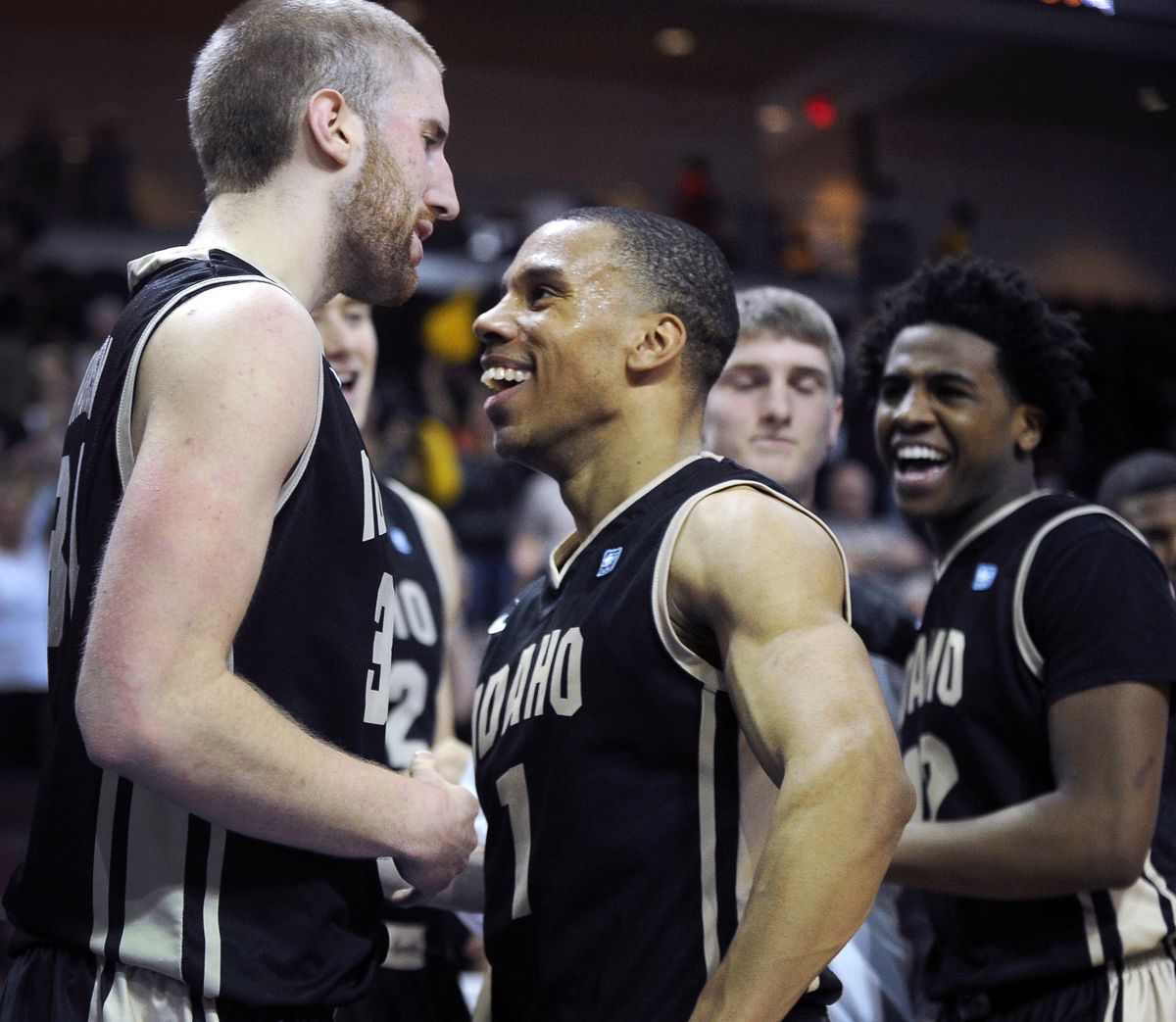 Idaho’s Stephen Madison, left and Glen Dean celebrate after defeating UMKC, 73-70 in the first round of the WAC tournament in Las Vegas. (Associated Press)