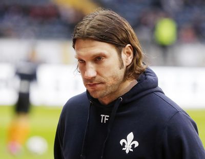 In this Feb. 5, 2017 file photo, Darmstadt’s head coach Torsten Frings walks on the pitch prior to a German first division Bundesliga soccer match between Eintracht Frankfurt and SV Darmstadt 98 in Frankfurt, Germany. Torsten Frings can’t afford to get too sentimental on his return to Werder Bremen. Now in charge of struggling Darmstadt, Frings needs points on Saturday March 4, 2017 - last-place Darmstadt is 10 points from safety with 12 games remaining. Bremen has no room for generosity, either. (Michael Probst / Associated Press)