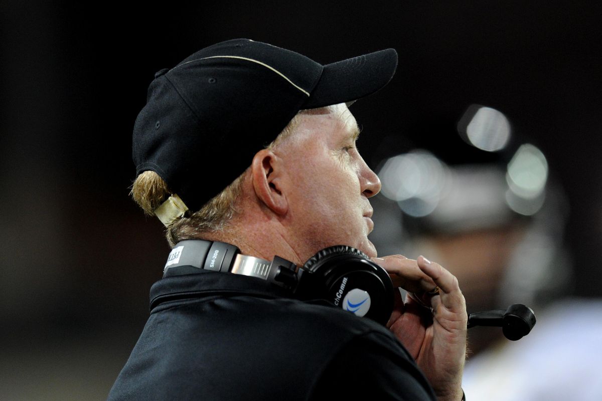 Idaho head coach Paul Petrino watches the game against Washington State unfold during the second half of a college football game on Saturday, September 21, 2013, at Martin Stadium in Pullman, Wash. (Tyler Tjomsland / The Spokesman-Review)