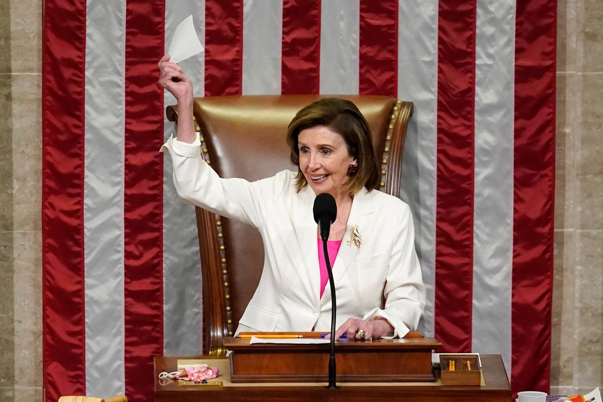 Speaker of the House Nancy Pelosi, D-Calif., presides over House passage of President Joe Biden