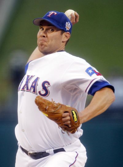 Rangers starter Colby Lewis is 3-0 this postseason after winning on Saturday. (Associated Press)