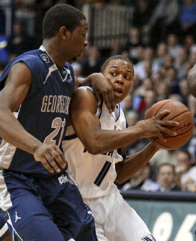 
Kyle Lowry (1) and Villanova have won 10 straight games, utilizing a quick four-guard lineup. 
 (Associated Press / The Spokesman-Review)