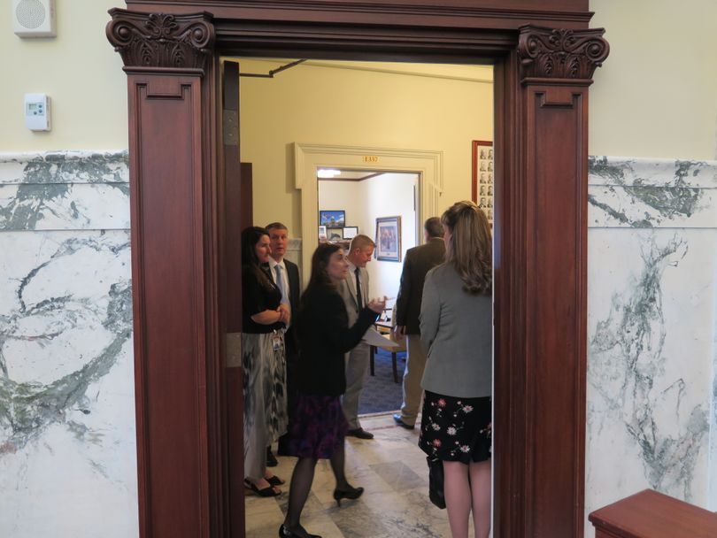 Reps. Heather Scott, R-Blanchard, and Priscilla Giddings, R-White Bird, huddle with House leadership on Thursday over a bill-reading question (Betsy Z. Russell)