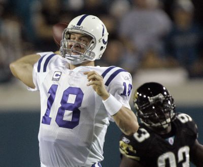 Colts quarterback Peyton Manning had an infected bursa sac in his knee. (Associated Press / The Spokesman-Review)