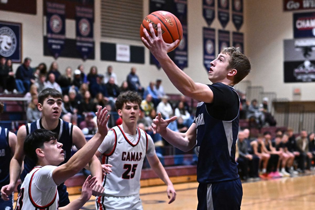 Gonzaga Bulldogs guard Ryan Carney (2) shoots the ball against Camas Papermakers Carson Thompson (33) in the first half of the East vs West Preseason Shootout on Friday, Dec. 5, 2025, at Mt. Spokane high school in Spokane,  (James Snook/For The Spokesman-Review)