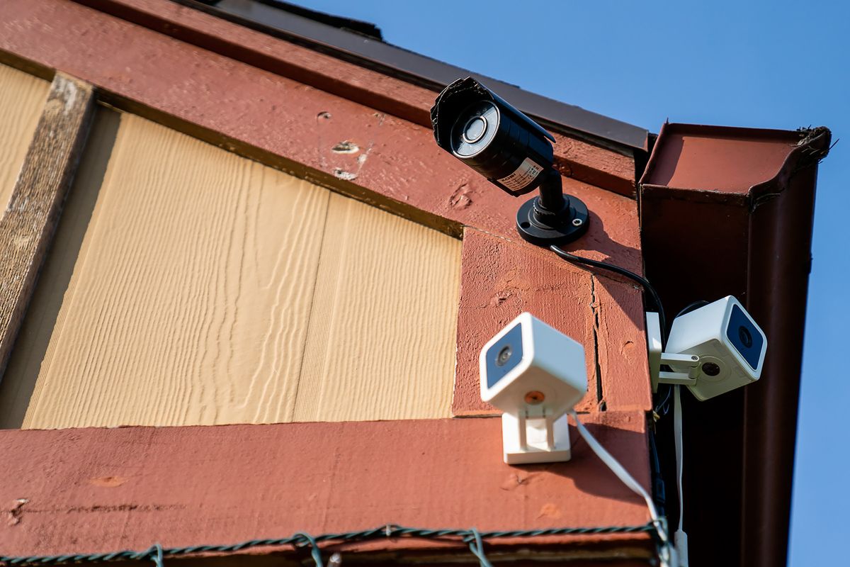 Multiple security cameras at the home of Titan Crawford, who leads PDX Stolen Cars, an army of volunteers hunting for stolen vehicles, in Portland, Ore., Oct. 17, 2022. Vehicle thefts have soared, and the police say they are focused on other crimes, but, in Portland, victims are helping each other track down their own cars. (Justin Katigbak/The New York Times) (JUSTIN KATIGBAK)