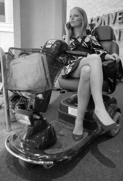 
Michelle Bailey, of Texas, sits on a scooter in the Riviera hotel-casino in Las Vegas.
 (Associated Press / The Spokesman-Review)